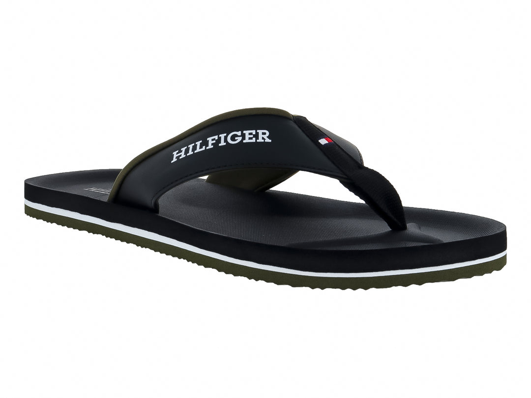 Sandalias de dedo negras Tommy Hilfiger con detalle blanco y verde en la suela.