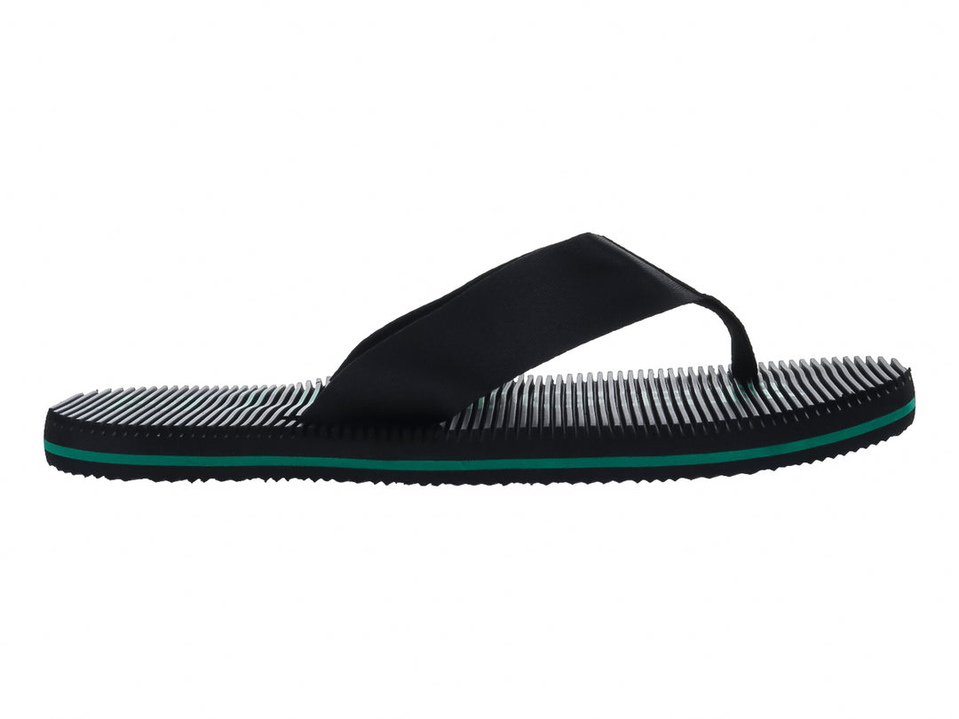 Sandalias Tommy Hilfiger color negro con detalle en la suela color verde y textura estriada.
