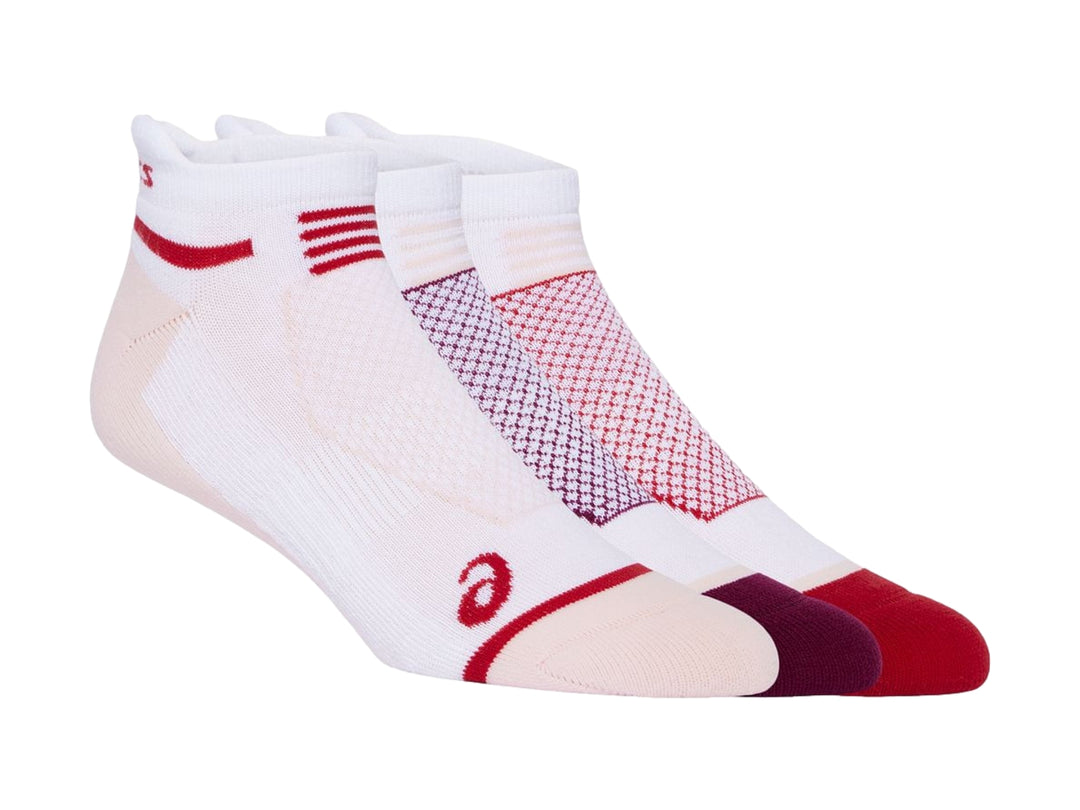 Set de cuatro calcetines deportivos ASICS en colores blanco, rosa, morado y rojo.