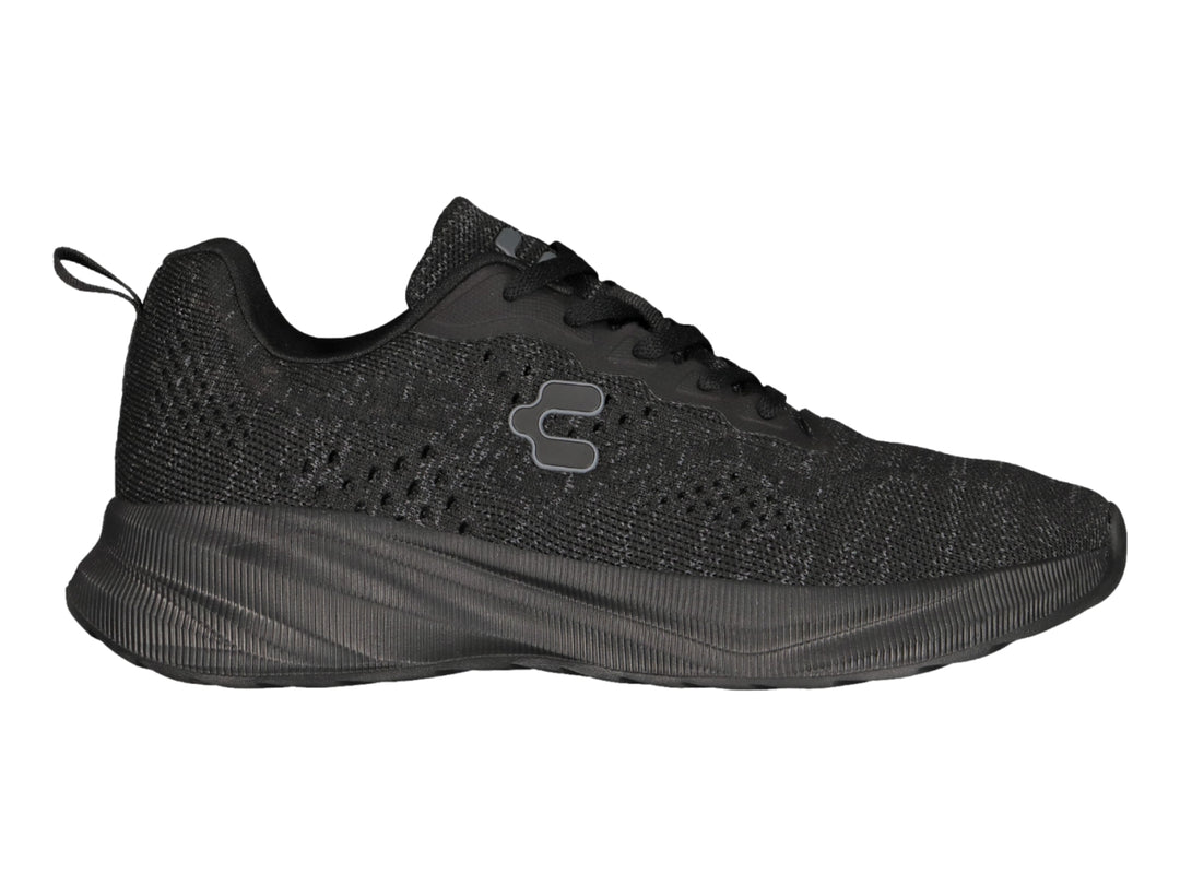 Tenis deportivos Charly en color negro con tejido transpirable y suela cómoda.