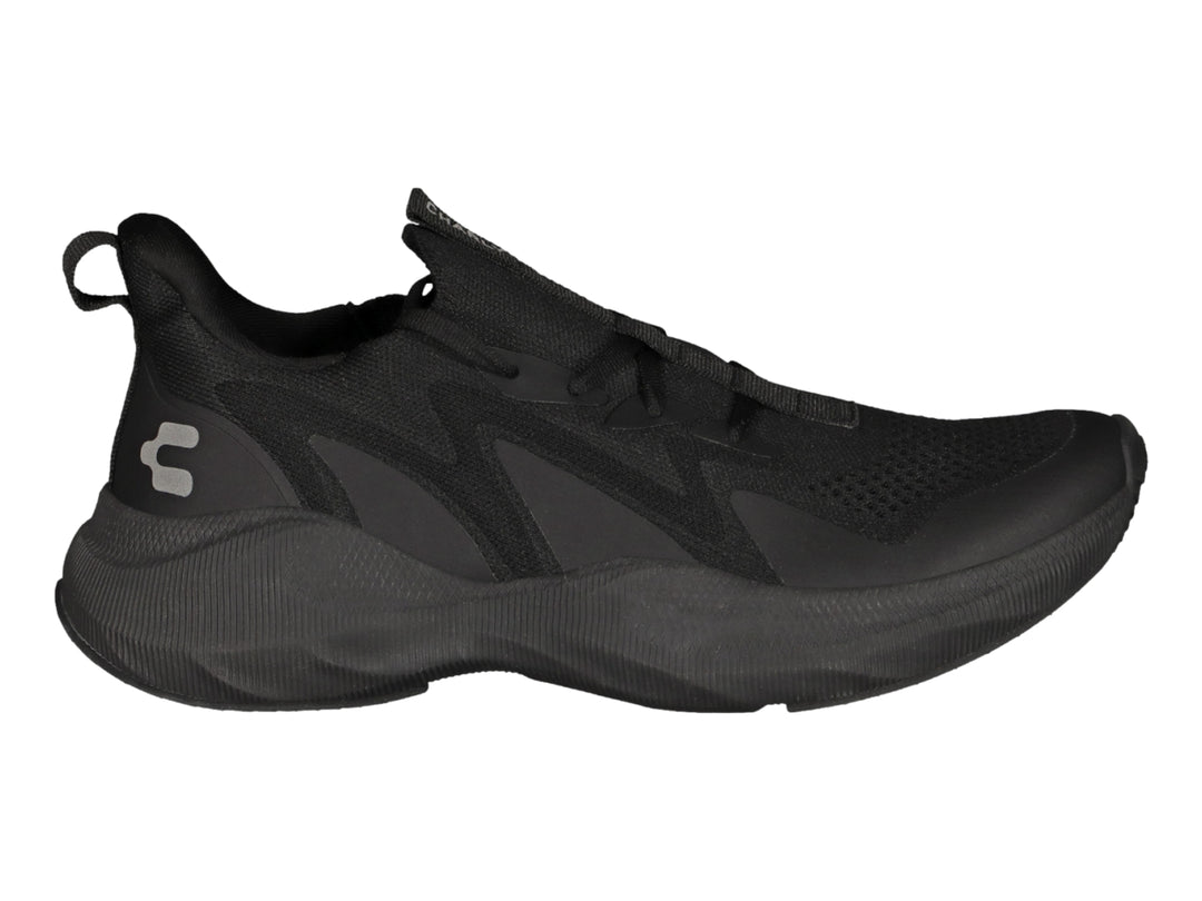Tenis deportivos Charly color negro total con diseño moderno y suela robusta.