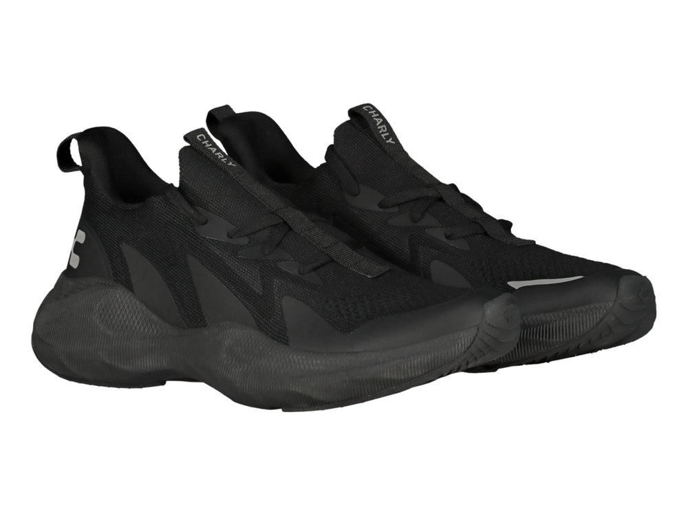 Tenis deportivos Charly color negro total con diseño moderno y suela robusta.