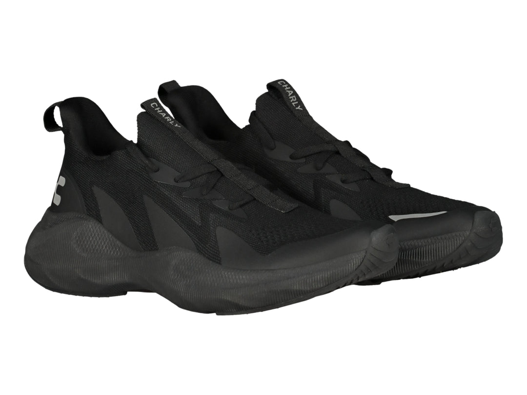 Tenis deportivos Charly color negro total con diseño moderno y suela robusta.