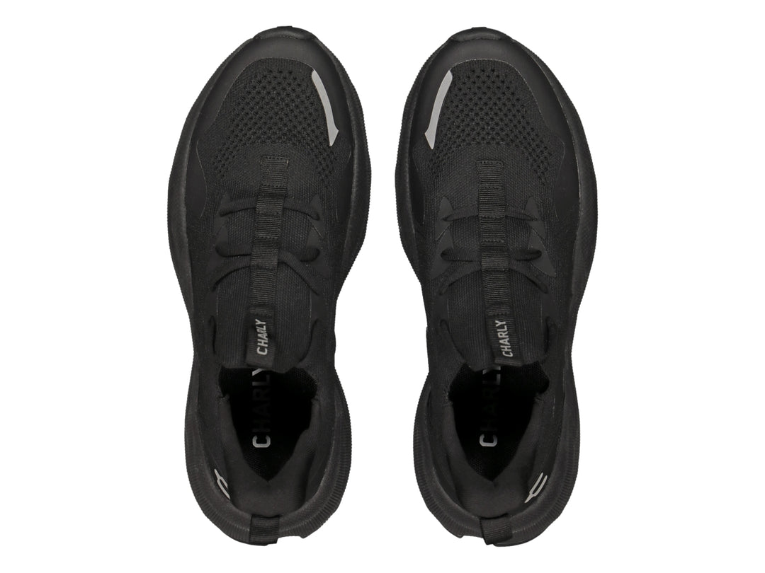 Tenis deportivos Charly color negro total con diseño moderno y suela robusta.
