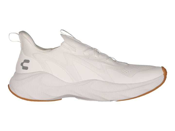 Tenis deportivos Charly color blanco con suela color café y detalles en relieve.