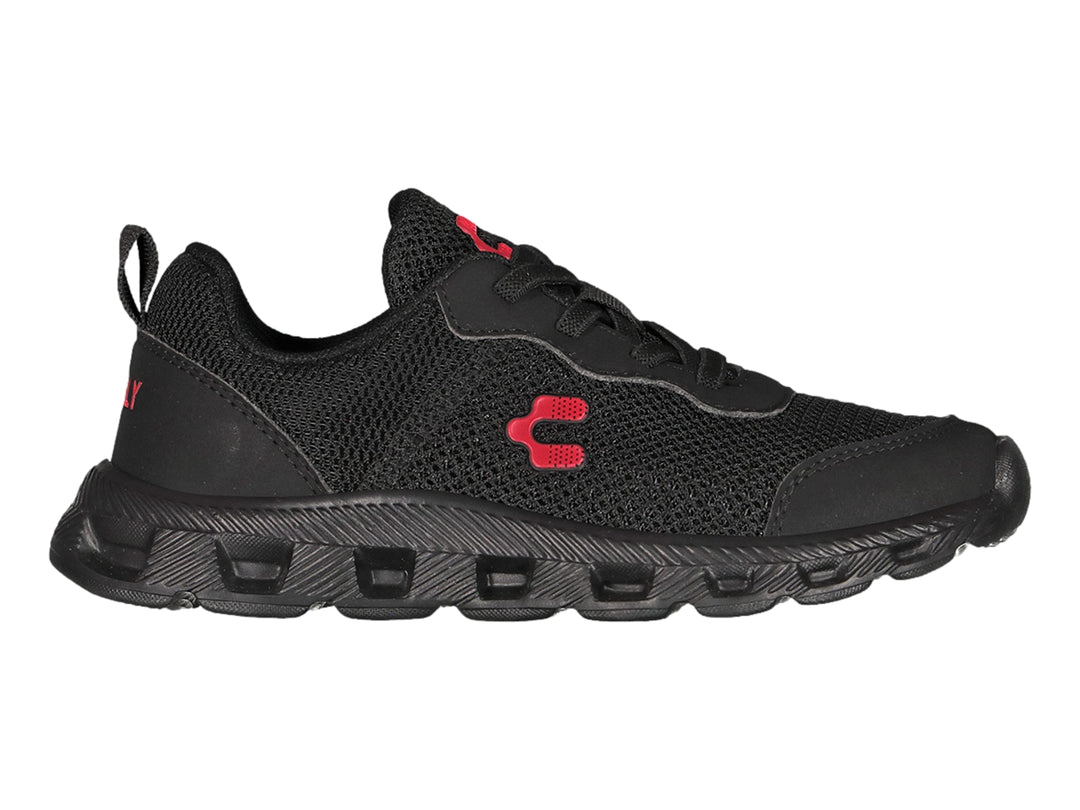 Zapato deportivo Charly para niño en color negro con detalles rojos y suela robusta.
