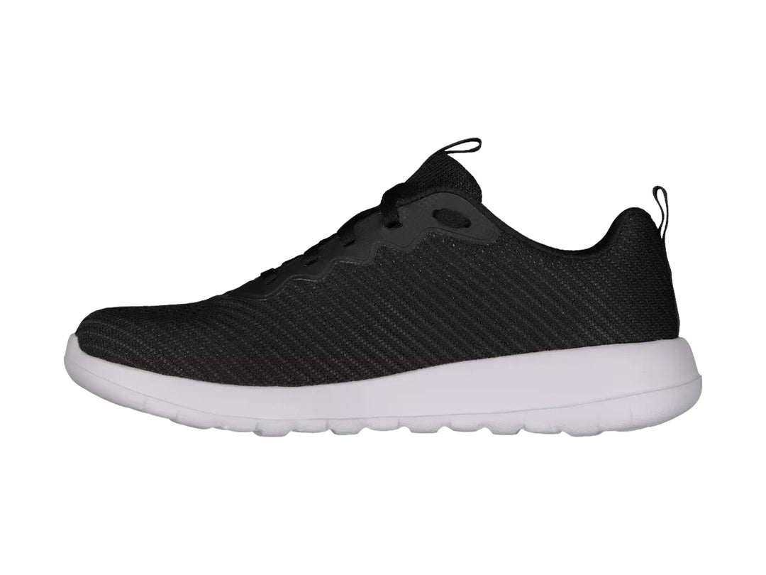 Tenis deportivos Skechers Go Walk Max en color negro con suela blanca y tejido transpirable.