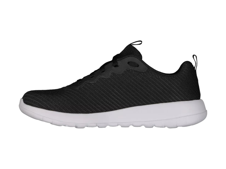 Tenis deportivos Skechers Go Walk Max en color negro con suela blanca y tejido transpirable.