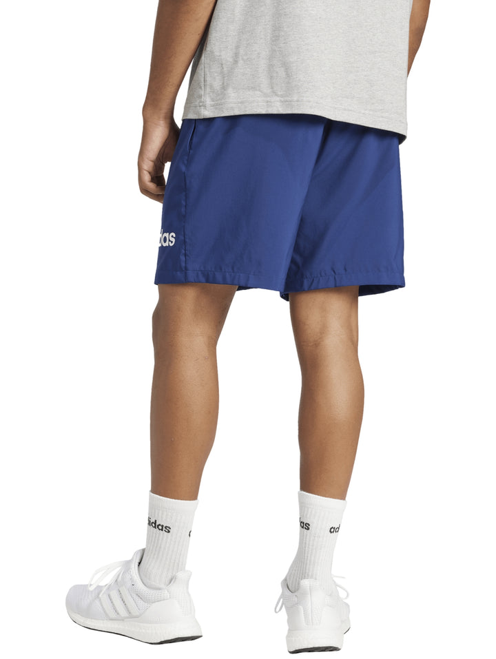Shorts deportivos Adidas color azul oscuro con logotipo blanco en la pierna izquierda.