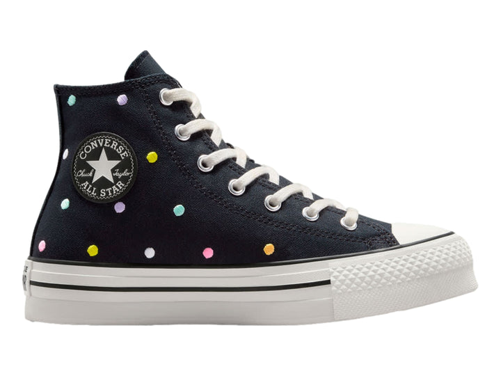 Tenis Converse Chuck Taylor All Star de bota color negro con lunares multicolores y suela blanca.