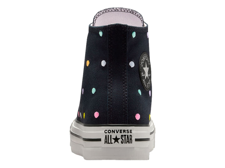Tenis Converse Chuck Taylor All Star de bota color negro con lunares multicolores y suela blanca.