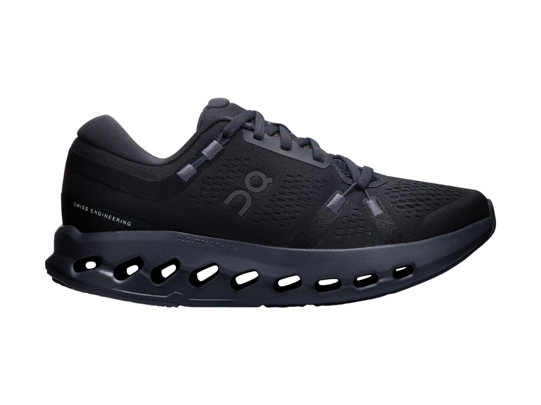 Tenis deportivos On Cloudsurfer 2 color negro con suela de celdas huecas y malla transpirable.