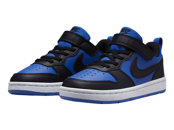 Tenis Nike Court Borough Low Recraft en colores azul y negro con suela blanca y azul.