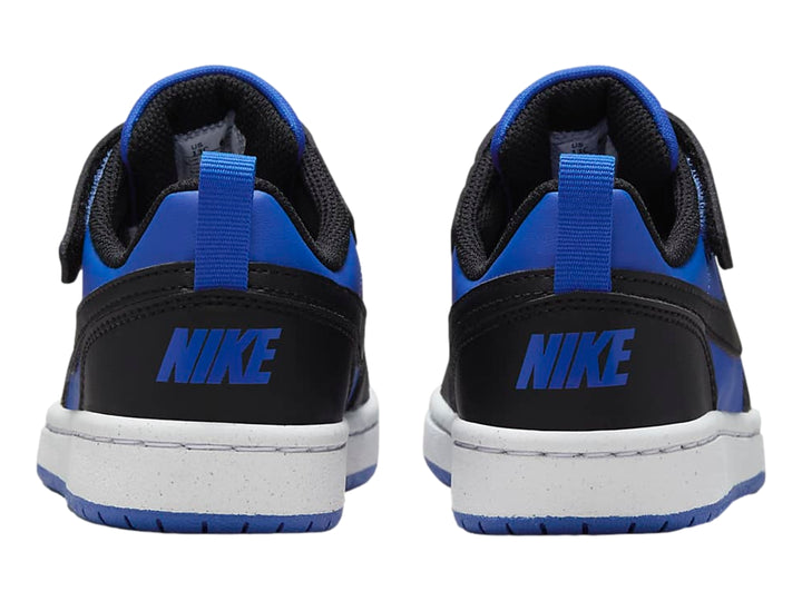 Tenis Nike Court Borough Low Recraft en colores azul y negro con suela blanca y azul.