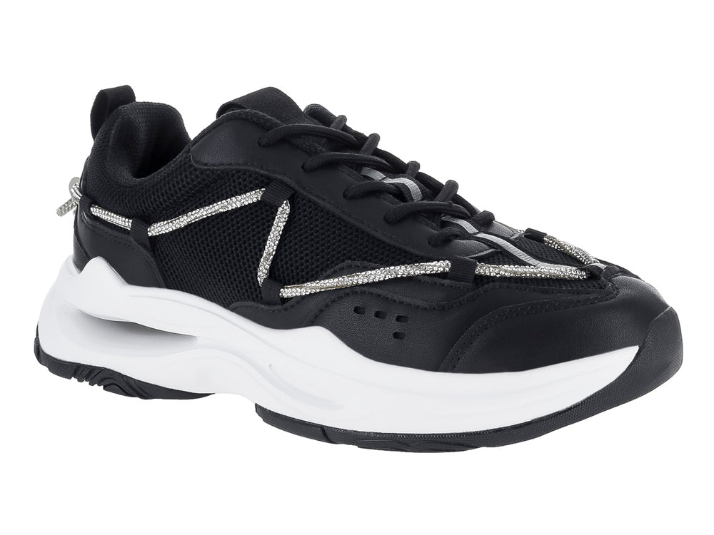 Tenis deportivos Clasben Karen en color negro con suela blanca gruesa y detalles de cordones decorativos grises.