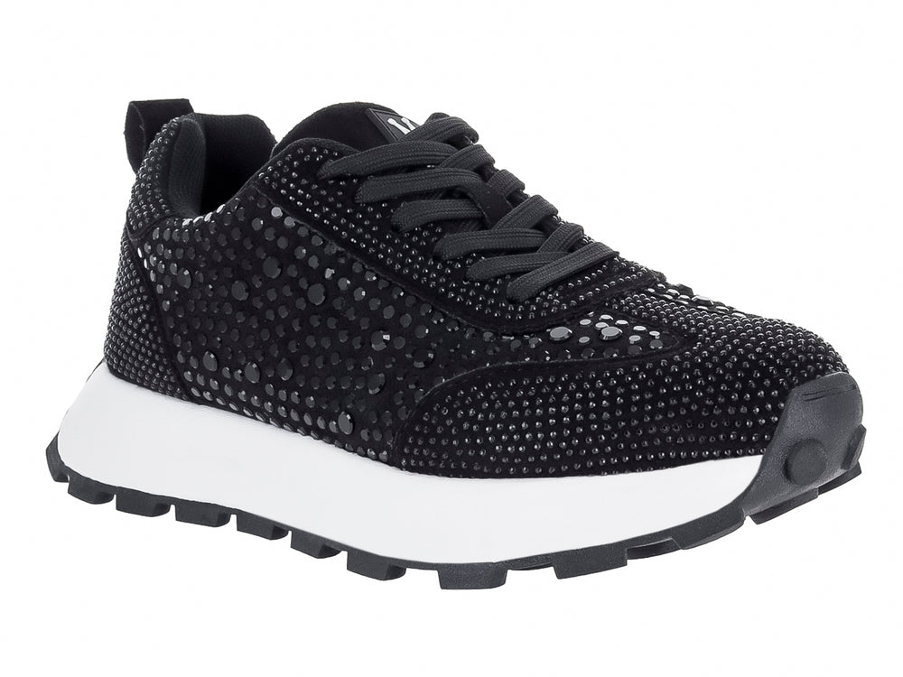 Tenis negros para mujer con detalles de pedrería brillante y suela blanca dentada.