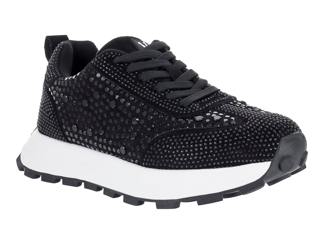 Tenis negros para mujer con detalles de pedrería brillante y suela blanca dentada.
