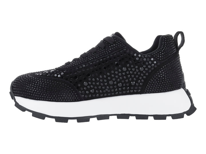 Tenis negros para mujer con detalles de pedrería brillante y suela blanca dentada.