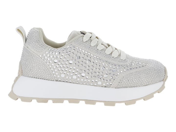 Tenis color beige con incrustaciones de cristales brillantes y suela blanca track.
