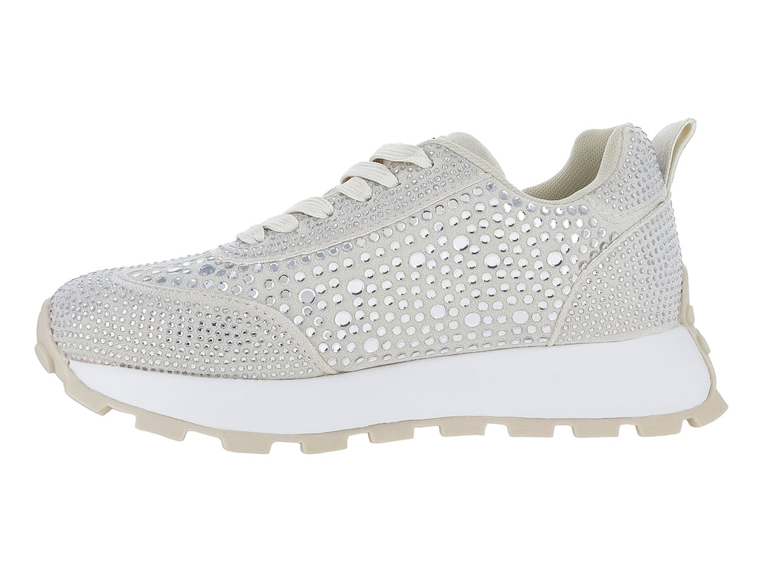 Tenis color beige con incrustaciones de cristales brillantes y suela blanca track.