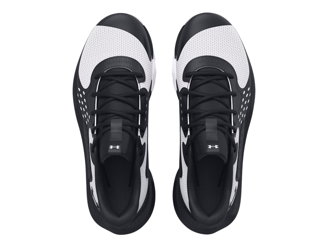 Tenis de baloncesto Under Armour en colores negro y blanco con diseño moderno y suela blanca.