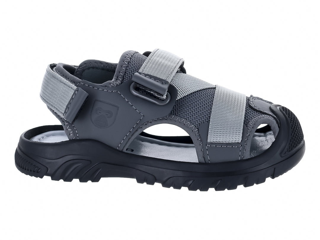 Sandalias UNGA color gris con suela negra y correas ajustables.