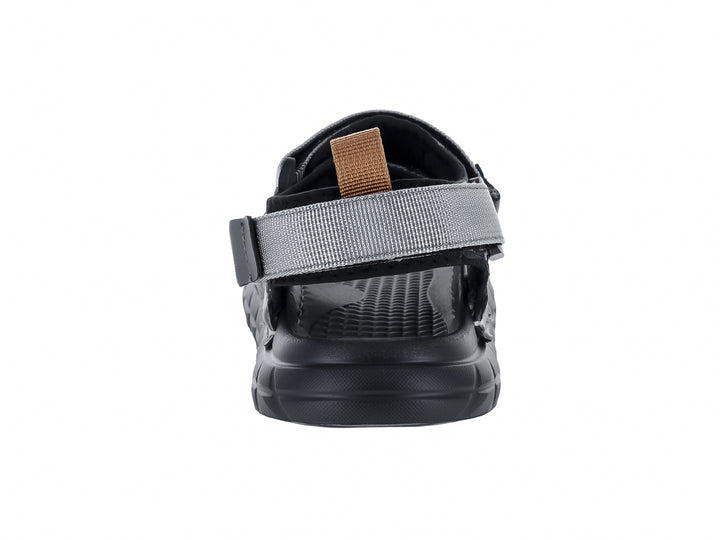 Sandalias color gris con correas ajustables y suela negra.