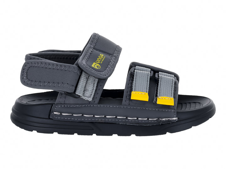 Sandalias UNGA color gris y negro con detalles amarillos y suela gruesa.