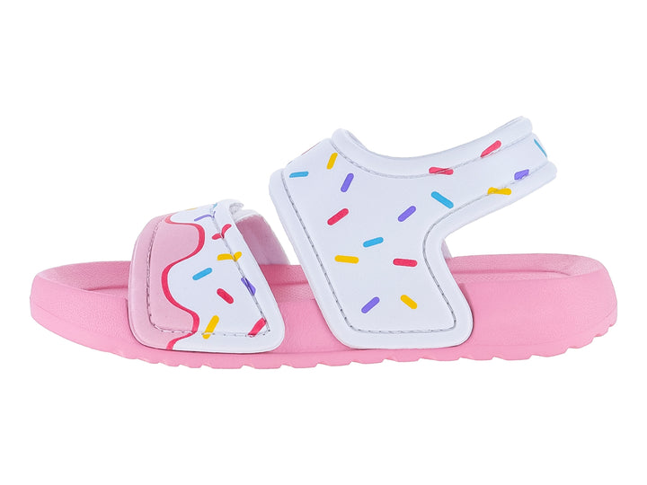 Sandalia infantil rosa y blanca con diseño de chispas de colores y un adorno de dona.