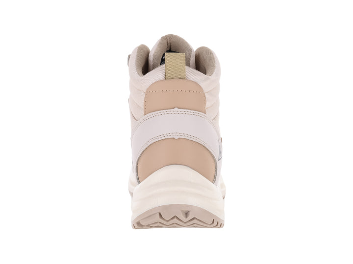 Botín deportivo Discovery en color marfil y beige con suela blanca robusta y cierre de cordones.
