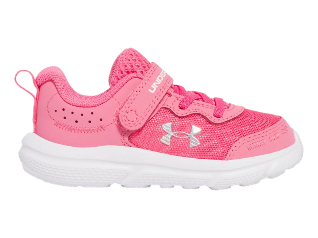 Tenis deportivos Under Armour color rosa con suela blanca y cierre de velcro para Niña.