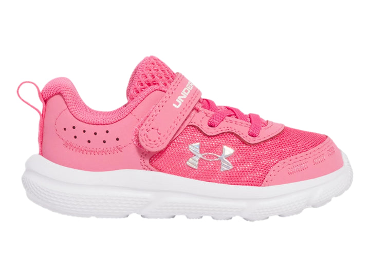 Tenis deportivos Under Armour color rosa con suela blanca y cierre de velcro para Niña.