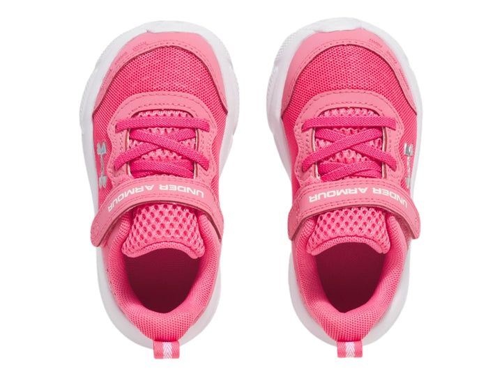 Tenis deportivos Under Armour color rosa con suela blanca y cierre de velcro para Niña.