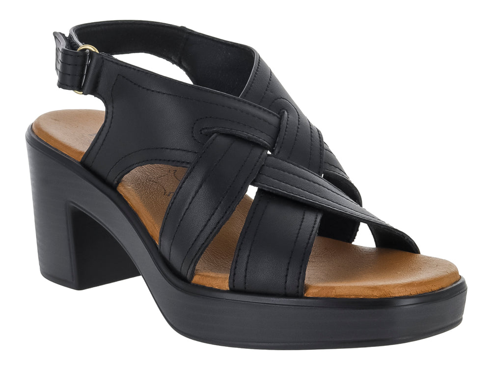 Sandalia Flexi color negro para mujer con tacón cuadrado, plataforma y tiras cruzadas en la parte frontal.