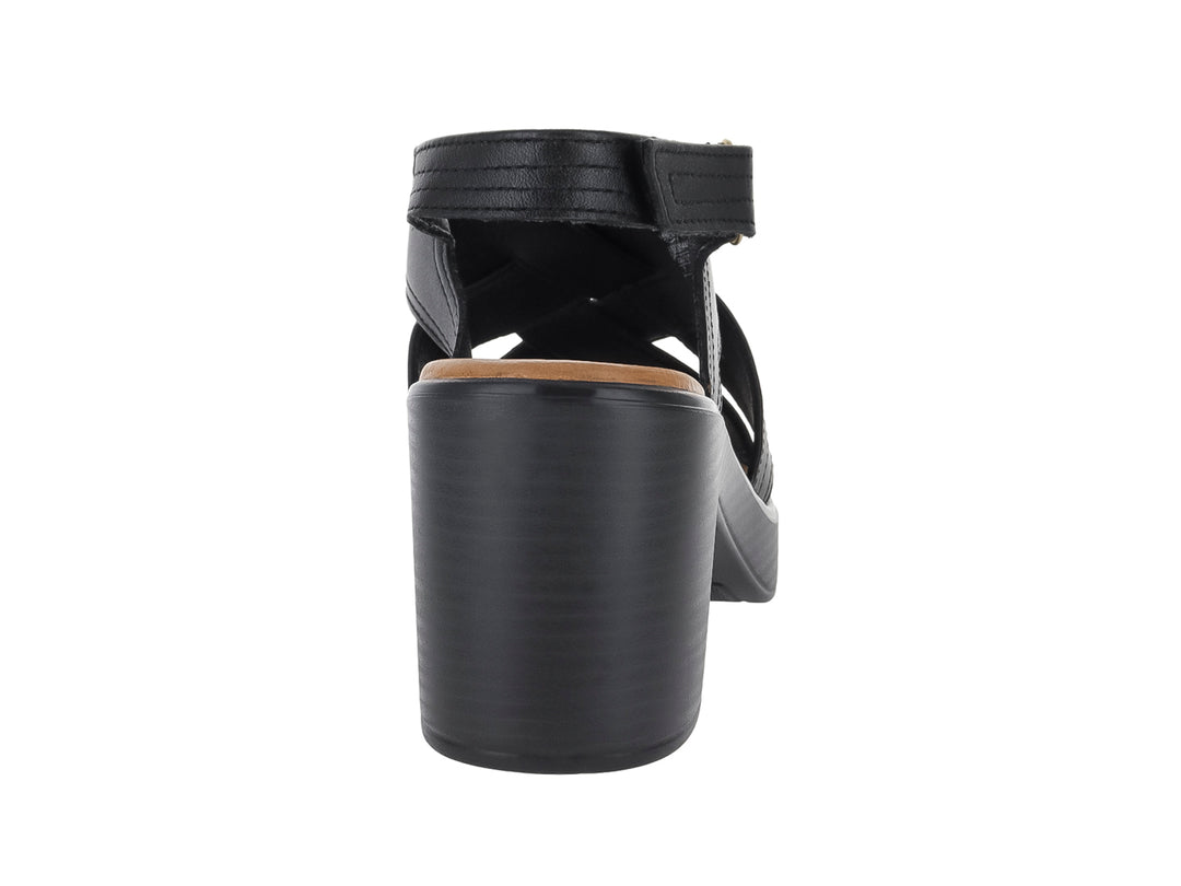 Sandalia Flexi color negro para mujer con tacón cuadrado, plataforma y tiras cruzadas en la parte frontal.