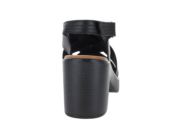 Sandalia Flexi color negro para mujer con tacón cuadrado, plataforma y tiras cruzadas en la parte frontal.