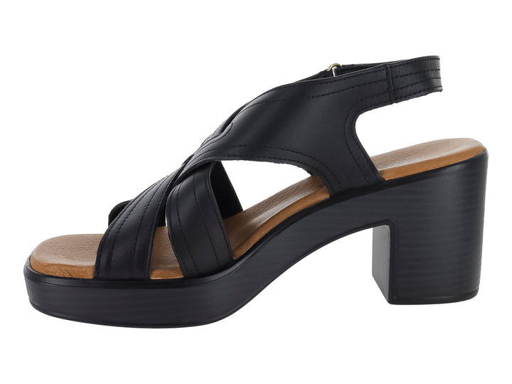 Sandalia Flexi color negro para mujer con tacón cuadrado, plataforma y tiras cruzadas en la parte frontal.