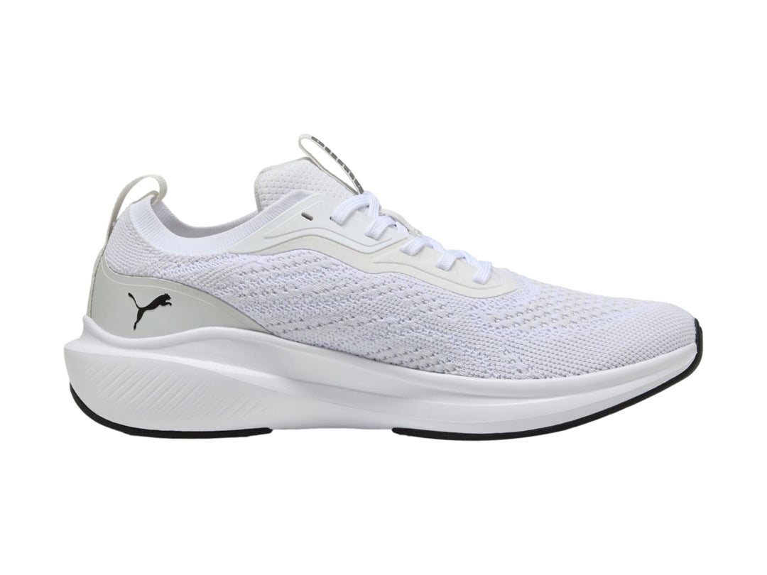 Tenis deportivos PUMA Skyrocket Lite en color blanco con detalles en gris y suela blanca.
