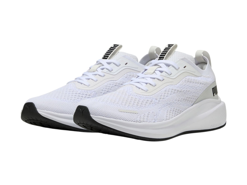 Tenis deportivos PUMA Skyrocket Lite en color blanco con detalles en gris y suela blanca.