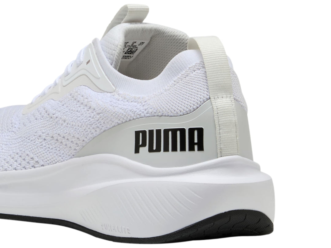 Tenis deportivos PUMA Skyrocket Lite en color blanco con detalles en gris y suela blanca.