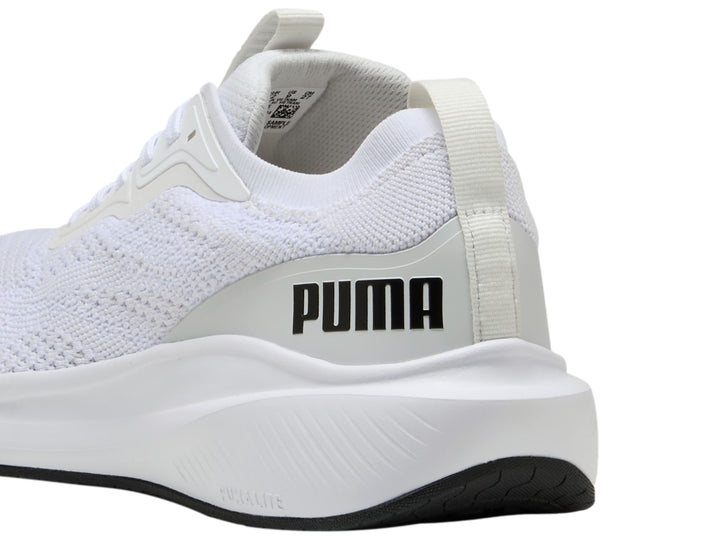 Tenis deportivos PUMA Skyrocket Lite en color blanco con detalles en gris y suela blanca.