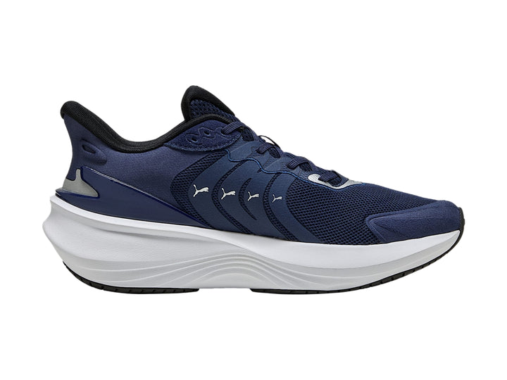 Tenis PUMA Pulse Pro en color azul marino con suela blanca y detalles en negro.