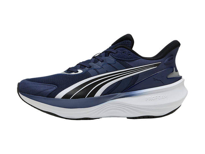 Tenis PUMA Pulse Pro en color azul marino con suela blanca y detalles en negro.