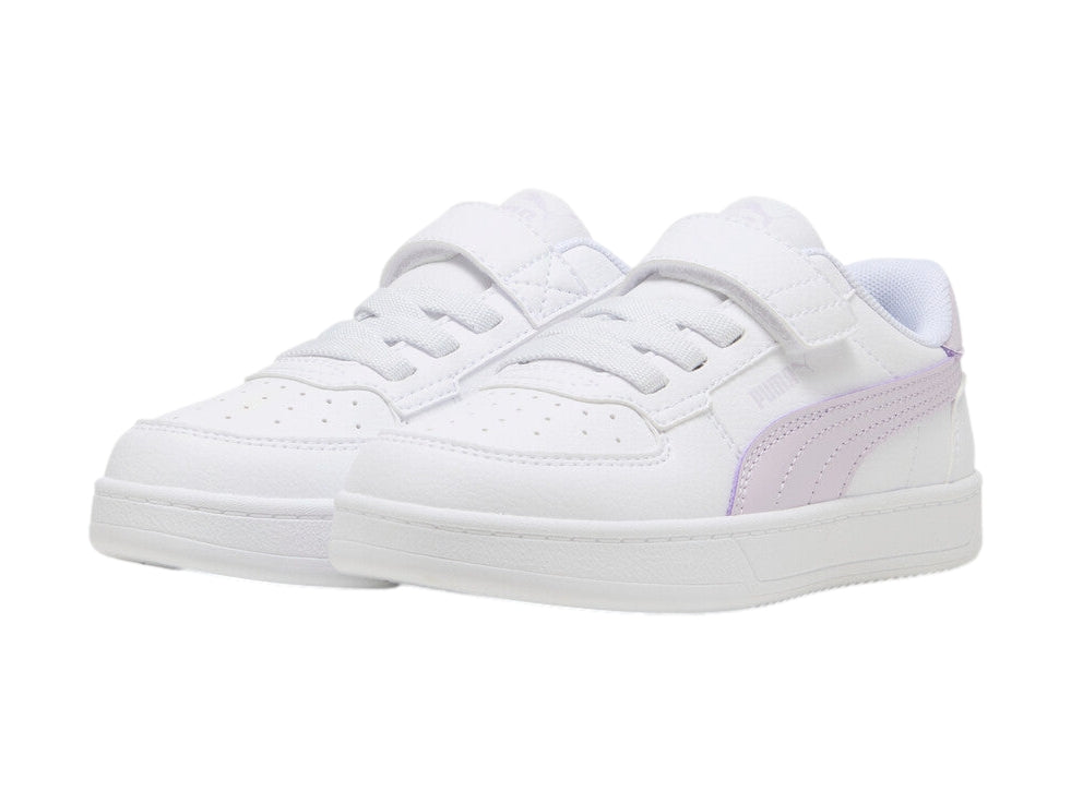 Tenis Puma blancos con detalles en color lila para niña.