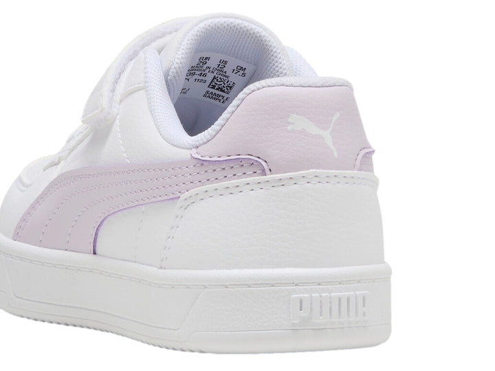 Tenis Puma blancos con detalles en color lila para niña.