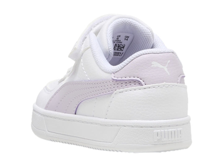 Tenis PUMA blancos con detalles en color lila y cierre de velcro para Niño.