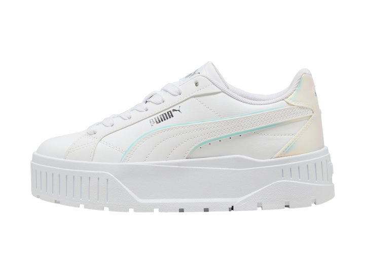 Tenis PUMA blancos para niños con suela de plataforma y detalles laterales en color holográfico.