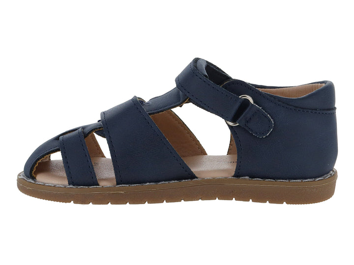Sandalia infantil color azul marino con suela café y correa de ajuste con velcro.