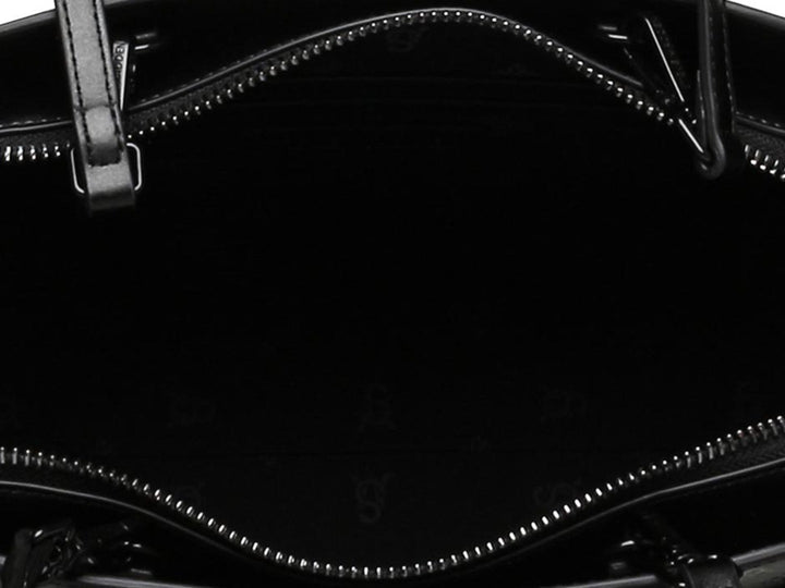 Bolso de hombro Steve Madden color negro con textura geométrica, asas cortas y correa larga ajustable.