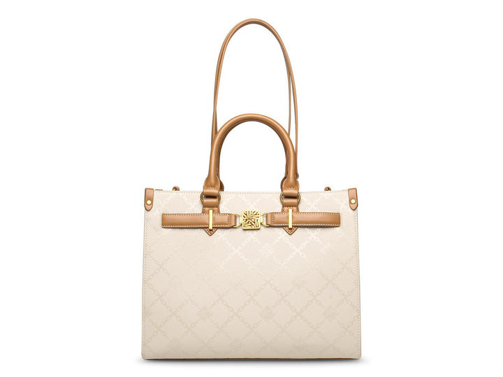 Bolso de hombro Steve Madden color hueso con detalles y asas en tono camel, diseño estructurado con relieve.